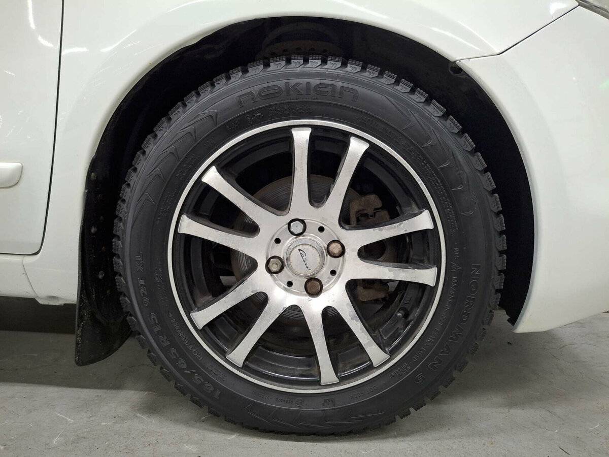 Nissan Note I Рестайлинг, 2012 Фото №18